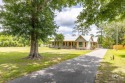 BEST PRICED HOME ON DEEP WATER - Enjoy this stunning waterfront for sale in Foley Alabama Baldwin County County on GolfHomes.com