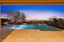 Situated on Hole 14, this beautifully upgraded home showcases for sale in Buckeye Arizona Maricopa County County on GolfHomes.com