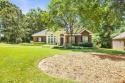 Traditional one-level brick home situated on a small cul-de-sac for sale in Spanish Fort Alabama Baldwin County County on GolfHomes.com