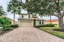 This stunning home features a spacious screened lanai with south for sale in Estero Florida Lee County County on GolfHomes.com