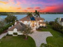 Welcome to this extraordinary waterfront estate located on a for sale in Belleair Beach Florida Pinellas County County on GolfHomes.com