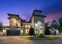 Behind the private gates of this distinguished Belleair estate for sale in Belleair Beach Florida Pinellas County County on GolfHomes.com