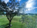 EXPANSIVE GOLF/WATER/CLUBHOUSE VIEW from this Favored LUXURY for sale in Coconut Creek Florida Broward County County on GolfHomes.com
