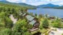 A totally renovated 2 level Lakeside Condominium being sold with for sale in Lake Placid New York Essex County County on GolfHomes.com