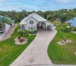 This RV resort home is the perfect winter retreat or your for sale in Titusville Florida Brevard County County on GolfHomes.com