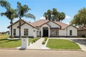 Gorgeous golf course views surround this 3-bedroom, 2.5-bath for sale in Weslaco Texas Hidalgo County County on GolfHomes.com