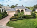 On the 8th green at Crown Colony, this 4/3 Sterling model has for sale in Fort Myers Florida Lee County County on GolfHomes.com