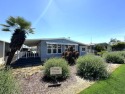This is a gorgeous REFRESHED Double Wide Home with amazing views for sale in Hemet California Riverside County County on GolfHomes.com