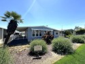 BIG PRICE REDUCTION!! This is a gorgeous REFRESHED Double Wide for sale in Hemet California Riverside County County on GolfHomes.com