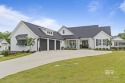 This gold fortified white painted concrete board home in the for sale in Fairhope Alabama Baldwin County County on GolfHomes.com