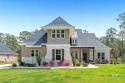 This beautiful, contemporary craftsman home with over $200,000 for sale in Gulf Shores Alabama Baldwin County County on GolfHomes.com