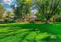 Integrated onto Hillcrest's 10th hole, this property honors a for sale in Boise Idaho Ada County County on GolfHomes.com