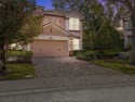 Rare End-Unit Townhome in Gated Bella Trae - Resort-Style Living for sale in Davenport Florida Osceola County County on GolfHomes.com