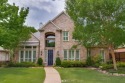 Nestled in the heart of Coppell, this beautifully renovated for sale in Coppell Texas Dallas County County on GolfHomes.com