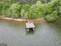 Welcome to an extraordinary Lake Hartwell waterfront opportunity for sale in Toccoa Georgia Stephens County County on GolfHomes.com