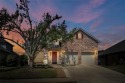 Located in the desirable Woodbridge community, home enjoys a for sale in Sachse Texas Collin County County on GolfHomes.com