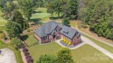 Nestled on Hole #5 at River Oaks Fairways, this stunning for sale in Statesville North Carolina Iredell County County on GolfHomes.com