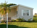 This 2005 Cavalier home is situated on a spacious lot on a for sale in Barefoot Bay Florida Brevard County County on GolfHomes.com