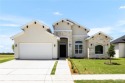 This beautiful 4-bedroom, 2.5-bath home offers a stunning lake for sale in Edinburg Texas Hidalgo County County on GolfHomes.com