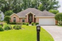 Welcome to your dream home in the sought-after Quail Creek golf for sale in Fairhope Alabama Baldwin County County on GolfHomes.com
