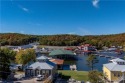 Welcome to this exceptional home in the coveted Redhead Cove for sale in Osage Beach Missouri Camden County County on GolfHomes.com