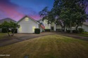 Stately Bay Point pool home with screened lanai on quiet for sale in Panama City Florida Bay County County on GolfHomes.com