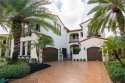 SOPHISTICATED ELEGANCE DESCRIBES THIS FORMER MODEL HOME WITH A for sale in Parkland Florida Broward County County on GolfHomes.com
