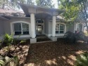 Spacious 3-bedroom, 3-bath home on nearly half an acre with for sale in Zephyrhills Florida Pasco County County on GolfHomes.com