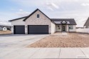 Welcome to this beautifully crafted 7-bedroom, 3-bathroom home for sale in Idaho Falls Idaho Bonneville County County on GolfHomes.com