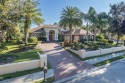 Luxury Living in Prestigious CHAMPIONS CLUB - Custom Pool Home for sale in Trinity Florida Pasco County County on GolfHomes.com