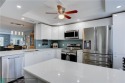 REMODELED*WITH MAGNIFICENT PANORAMIC WATER & GOLF COURSE VIEWS for sale in Coconut Creek Florida Broward County County on GolfHomes.com