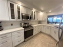 Beautifully remodeled 3 bedroom 2 bath first floor unit WITH for sale in Sunrise Florida Broward County County on GolfHomes.com