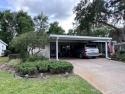 Large open living room, 2 big bedrooms and 2 full bathrooms for sale in Deland Florida Volusia County County on GolfHomes.com
