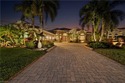 Where luxury living meets breathtaking lake views, this for sale in Estero Florida Lee County County on GolfHomes.com