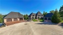 Welcome to a one-of-a-kind luxury estate in a gated Osage Beach for sale in Osage Beach Missouri Camden County County on GolfHomes.com