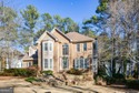 Imagine pulling into the driveway of a stunning traditional for sale in Woodstock Georgia Cherokee County County on GolfHomes.com