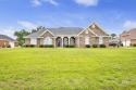 Discover this beautiful 3 bed, 2.5 bath home with an office in for sale in Foley Alabama Baldwin County County on GolfHomes.com
