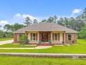 Welcome to 8145 Bay View Dr in Foley, Alabama - a beautifully for sale in Foley Alabama Baldwin County County on GolfHomes.com