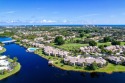 Come enjoy the gorgeous sunsets & long lake views from this for sale in Jupiter Florida Palm Beach County County on GolfHomes.com
