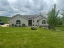 Ever dreamed of grabbing your clubs and golfing right out your for sale in Mondovi Wisconsin Buffalo County County on GolfHomes.com