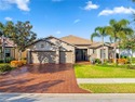 This home HAS IT ALL - GOLF MEMBERSHIP, BREATHTAKING WATER & for sale in Ave Maria Florida Collier County County on GolfHomes.com