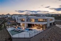 Guard-gated 2-story w/unobstructed lake  mountain views. Largest for sale in Henderson Nevada Clark County County on GolfHomes.com