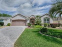 BOND PAID on this LOVELY 3/2 LANTANA with OVERSIZED ENCLOSED for sale in The Villages Florida Marion County County on GolfHomes.com