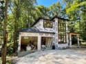 This house in Bella Vista is a masterpiece of design, it is for sale in Bella Vista Arkansas Benton County County on GolfHomes.com