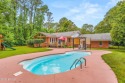 Welcome to Sweet Tea Island, a warm & inviting rambling ranch for sale in Beaufort South Carolina Beaufort County County on GolfHomes.com