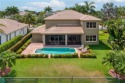 Stunning 5 bedroom, 3 full bathroom home offers a  beautiful for sale in Parkland Florida Broward County County on GolfHomes.com