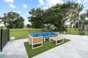 Welcome to Your Dream Retreat! This spacious 3-bedroom, 2-bath for sale in Tamarac Florida Broward County County on GolfHomes.com