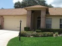 Maintenance free living. This two-bedroom, two-bath villa with a for sale in New Port Richey Florida Pasco County County on GolfHomes.com