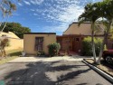 Welcome to this beautifully maintained 3 BR, 2 BA for sale in Pembroke Pines Florida Broward County County on GolfHomes.com