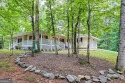 Nestled in Burton Getaways Community, this charming Fee Simple for sale in Clayton Georgia Rabun County County on GolfHomes.com
